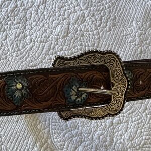 Tooled Brown Leather Belt with Blue Floral Accents and Ornate Silver Buckle